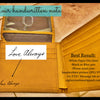 Yellow wallet with 'Love Always' handwriting on a wooden surface