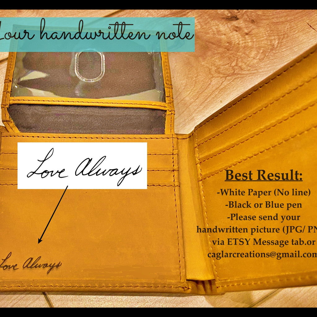Yellow wallet with 'Love Always' handwriting on a wooden surface