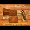Brown leather wallet with 'I Love You' engraving on a wooden surface