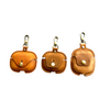 three types of AirPods cases in brown