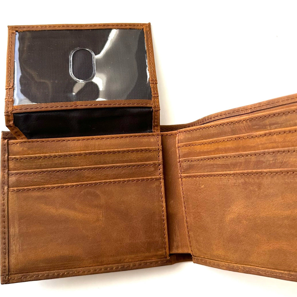 An open brown leather bifold wallet with multiple card slots, a black interior lining, and a clear plastic ID window on the left panel, photographed against a white background.