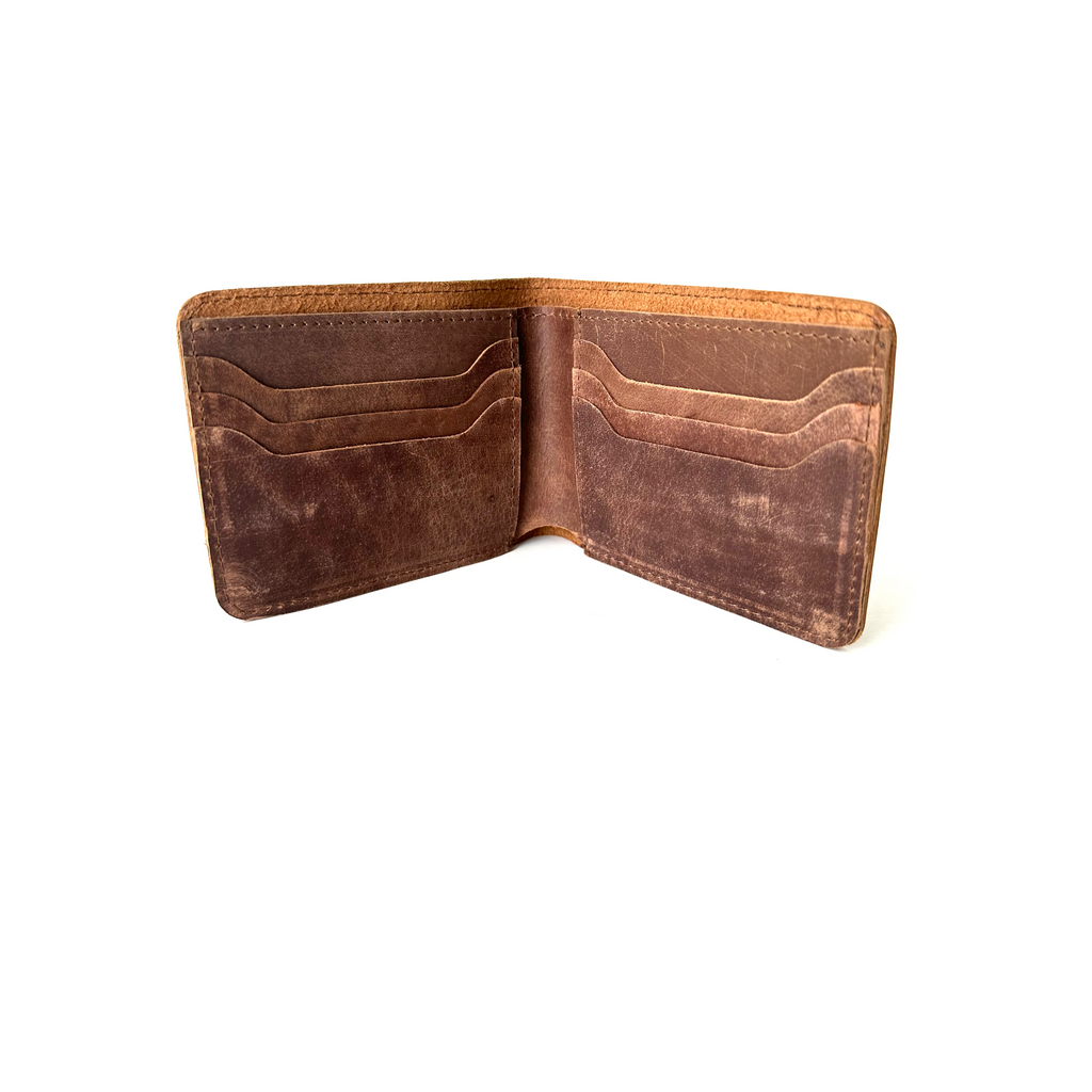 a distressed slim wallet inside