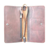 An open distressed brown leather wallet with a wristlet strap, showing interior card slots, a vertical zip pocket, and silver snap closures on a white background.
